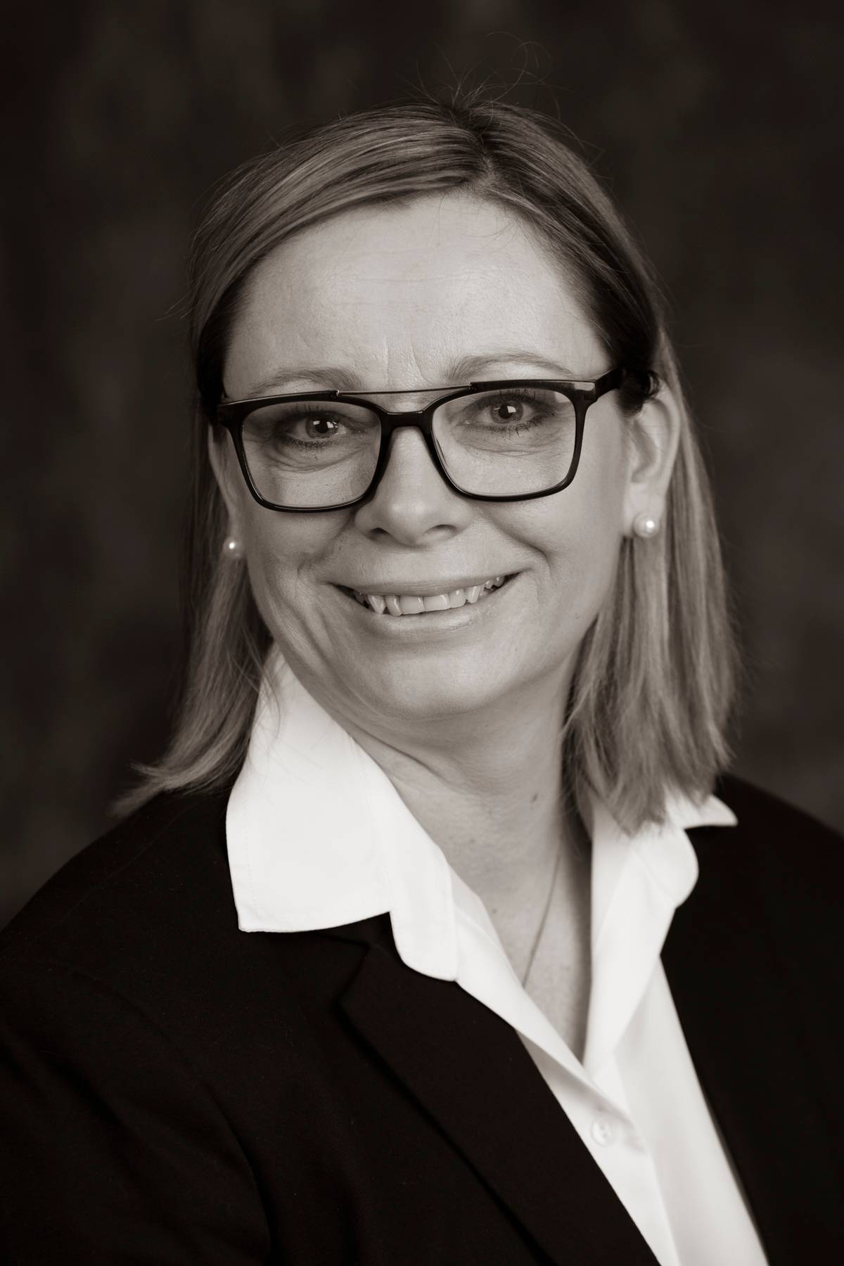 Et portrett av en kvinne med briller, CV foto